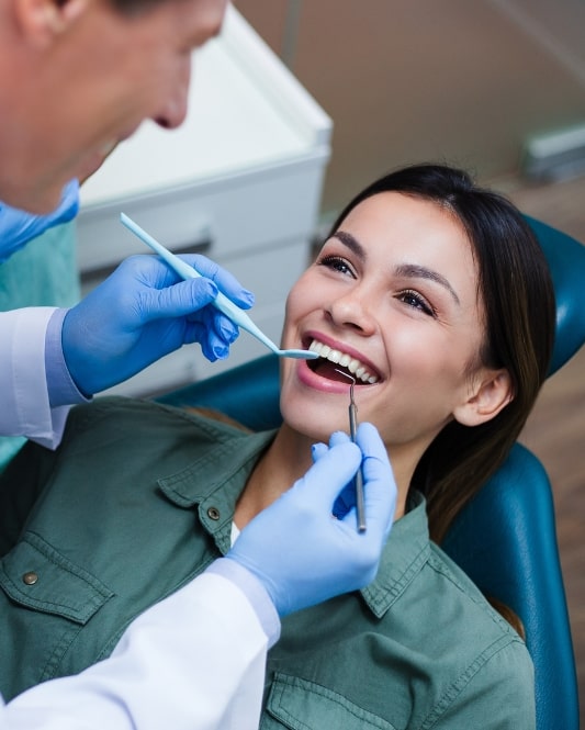 denture patient undergoing checkup