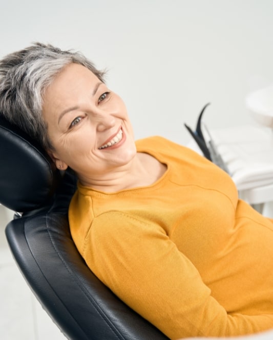 denture patient happy in seat