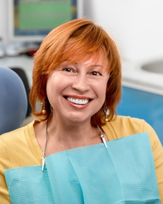 denture patient smiling at camera